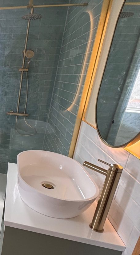 Wallasey New Bathroom Wirral bathroom upgrade featuring Ca’Pietra tiles, floating vanity and LED mirror
